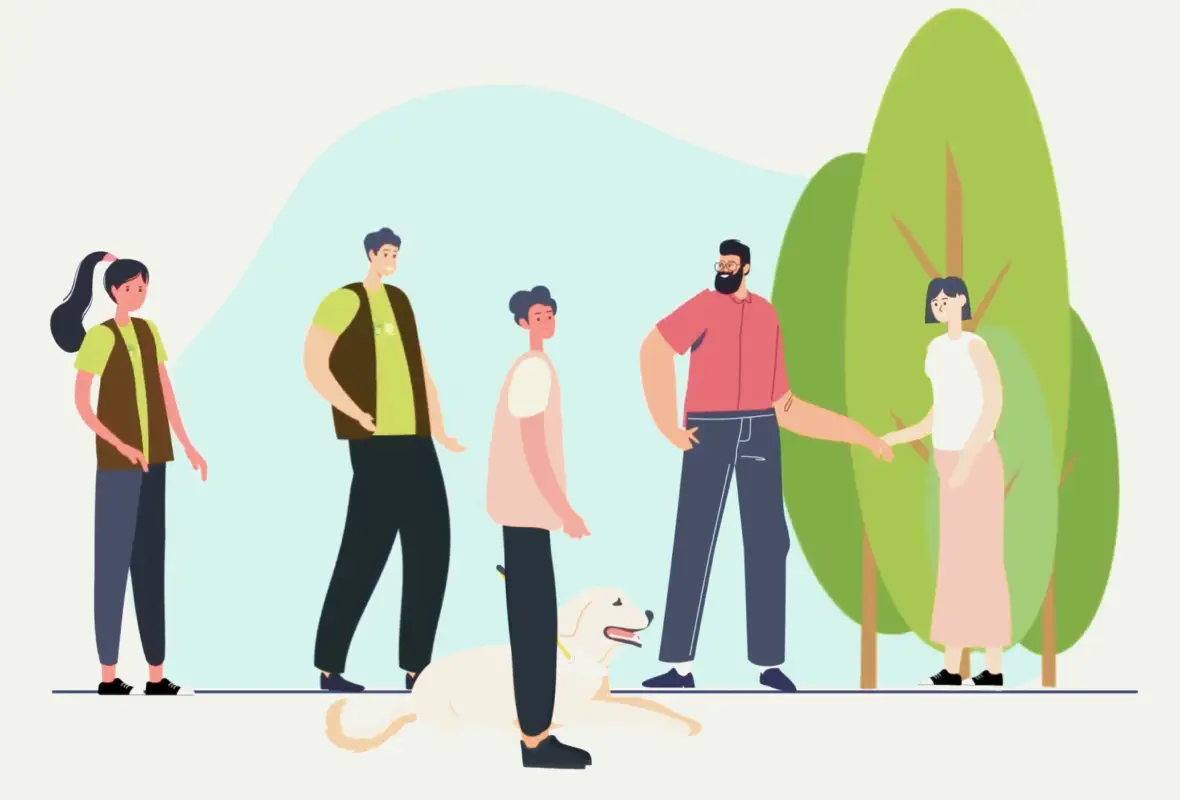 A diverse group of five people stand together in a park setting with a large green tree, with one person holding a dog's leash.