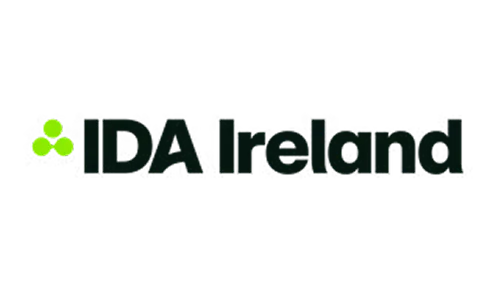 The IDA Ireland logo featuring a stylized green shamrock symbol alongside dark text reading "IDA Ireland".